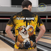 Load image into Gallery viewer, Person wearing a black and yellow bowling shirt with a bulldog graphic and 'TEAM NAME' text.