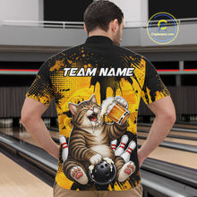 Load image into Gallery viewer, Person wearing a bowling-themed shirt with a cat design in a bowling alley.