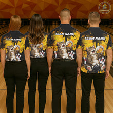 Load image into Gallery viewer, Four people wearing matching bowling-themed shirts with a cat design on a bowling alley.