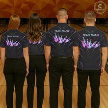 Load image into Gallery viewer, Four people wearing black shirts with colorful designs and 'TEAM NAME' text on a bowling alley.