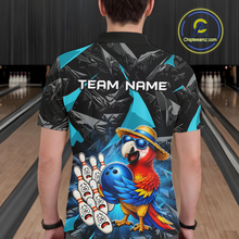 Load image into Gallery viewer, Person wearing a bowling-themed shirt with a parrot design in a bowling alley.