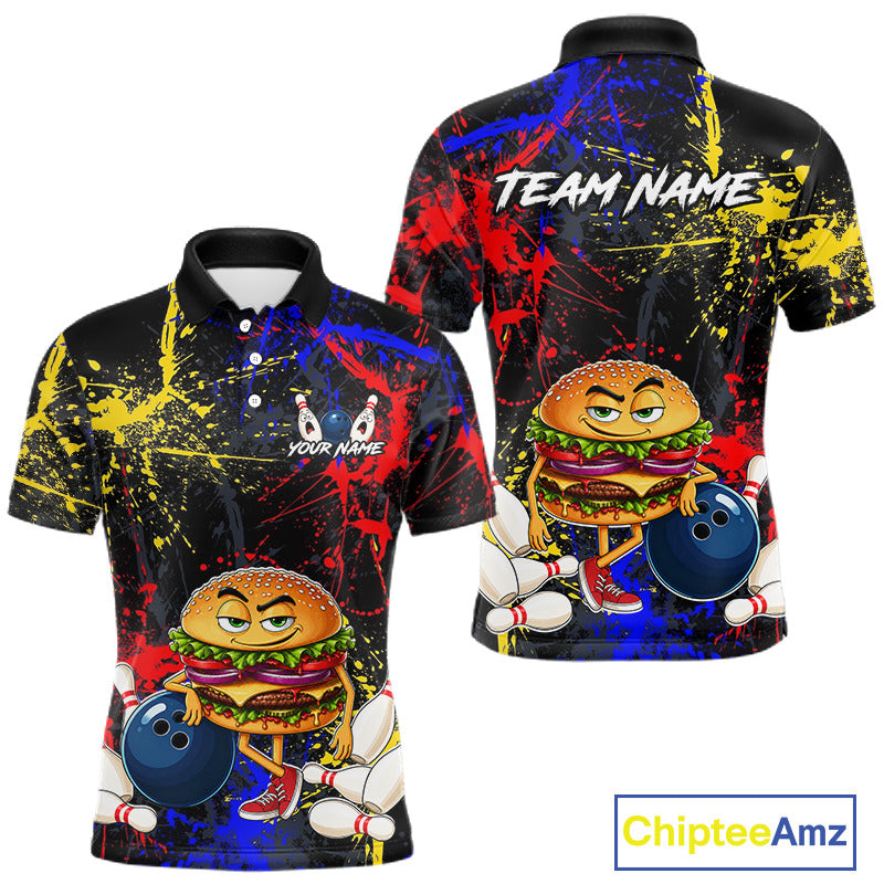 Front and back views of a short-sleeve black polo shirt with a colorful bowling-themed graphic featuring a cartoon burger character, bowling balls, and paint splatter. The front shows placeholder text 'YOUR NAME' and 'TEAM NAME' on the back.