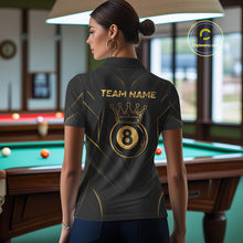 Load image into Gallery viewer, Person wearing a black and gold polo shirt with 'Team Name' and number 8 design in a pool hall.
