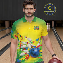 Load image into Gallery viewer, Male model in a bowling lane wearing green and yellow polo shirt, front view featuring autism puzzle bowling ball and pins illustration