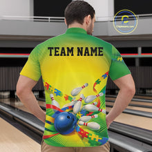 Load image into Gallery viewer, Male model in a bowling lane wearing a green and yellow quarter-zip shirt, puzzle bowling strike artwork with energetic autism-themed design.