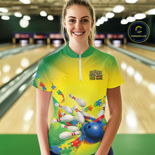 Load image into Gallery viewer, Female model in a bowling lane wearing a green and yellow quarter-zip shirt, autism puzzle bowling ball and pins with vibrant graphic style.