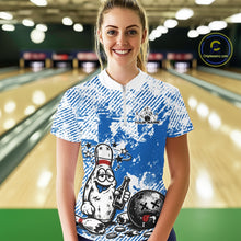 Load image into Gallery viewer, Front view female model in blue and white quarter zip bowling shirt in bowling lane, cartoon bowling pin drinking beer and holding ball graphic