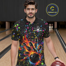 Load image into Gallery viewer, Male model wearing a black bowling polo shirt at the lane with vibrant splatter accents and bowling strike artwork.