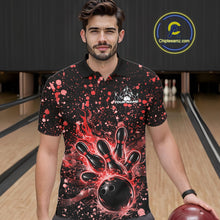 Load image into Gallery viewer, Male model wearing a black bowling polo shirt at the bowling lane with red splatter accents and bowling strike graphics.