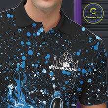 Load image into Gallery viewer, Left chest close-up of a black bowling polo shirt with flaming bowling graphics and blue paint splatter accents.