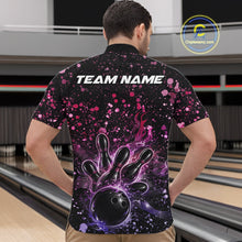 Load image into Gallery viewer, Front view of a male model in a black bowling quarter-zip shirt showcasing fiery bowling graphics with pink and purple paint splatter details.