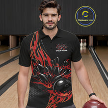 Load image into Gallery viewer, Front view of a male model in a bowling lane wearing a black polo shirt with red flaming black bowling ball striking pins and energetic sports styling.