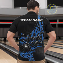 Load image into Gallery viewer, At the bowling lane, front view male model wearing black quarter zip shirt featuring blue flame bowling ball striking pins in energetic sports design.