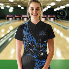 Load image into Gallery viewer, Female model front view in bowling alley wearing black quarter zip shirt with blue flame bowling ball hitting pins illustration