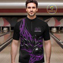 Load image into Gallery viewer, Male model front view in a bowling lane wearing a black quarter zip shirt featuring purple flaming black bowling ball striking pins in a dynamic sports action design.