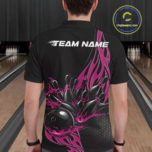 Load image into Gallery viewer, Male model seen from the back in a bowling lane wearing a black polo shirt featuring a pink flaming black bowling ball striking pins in a vivid sports illustration.