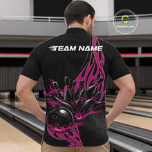 Load image into Gallery viewer, Front view male model at bowling venue wearing black quarter zip with pink flame bowling ball hitting pins in dynamic sports action scene.
