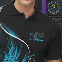 Load image into Gallery viewer, Close-up view of the left chest area of a black and blue bowling polo shirt showing a flame bowling ball and pins design detail.