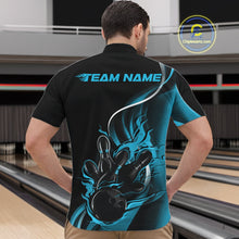 Load image into Gallery viewer, Male model front view inside bowling center wearing black and blue quarter zip shirt showcasing flaming bowling strike graphics