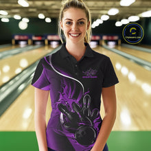 Load image into Gallery viewer, Female model front view in a bowling lane wearing a black and purple polo shirt featuring flame bowling ball striking pins in dynamic sports artwork.
