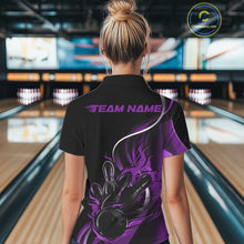 Load image into Gallery viewer, Back view female model at bowling lane wearing black and purple quarter zip shirt featuring flame bowling ball hitting pins artwork