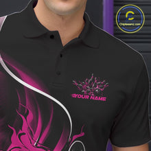 Load image into Gallery viewer, Close-up view of the left chest area of a black and pink bowling polo shirt showing a flame bowling ball and pins design detail.
