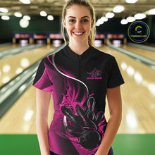 Load image into Gallery viewer, Female model front view at bowling lane wearing black and pink quarter zip shirt with flaming bowling strike artwork and bold energy