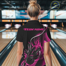 Load image into Gallery viewer, Back view female model in bowling venue wearing black and pink quarter zip shirt featuring flame bowling ball knocking down pins graphics