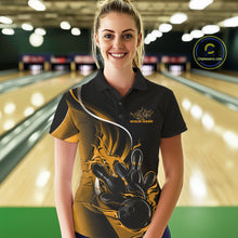 Load image into Gallery viewer, Female model front view in bowling lane wearing black and yellow polo shirt with flaming bowling ball hitting pins in energetic action design.