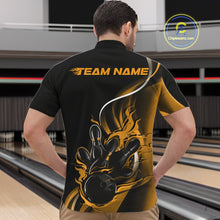 Load image into Gallery viewer, Male model front view inside bowling center wearing black and yellow quarter zip shirt featuring flaming bowling ball hitting pins artwork