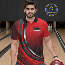 Load image into Gallery viewer, Male model in a bowling alley wearing a black and red polo shirt with honeycomb accents and a dynamic flame bowling ball hitting pins design.