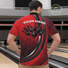 Load image into Gallery viewer, Male model at a bowling lane wearing a black and red quarter zip shirt featuring honeycomb pattern and a dynamic flame bowling ball hitting pins design.