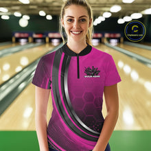 Load image into Gallery viewer, Female model wearing a black and pink bowling quarter zip featuring honeycomb artwork and a flaming bowling ball striking pins at the bowling lane.