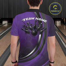 Load image into Gallery viewer, Back view of a male model in a bowling lane wearing a black and purple polo shirt, featuring a honeycomb pattern with a flaming bowling ball striking pins.