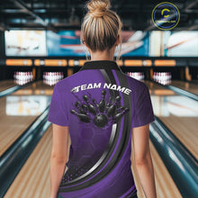 Load image into Gallery viewer, Back view of a female model in a bowling lane wearing a black and purple polo shirt, showcasing honeycomb texture with a flaming bowling action graphic.