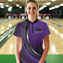 Load image into Gallery viewer, Front view of a female model wearing a black and purple bowling quarter zip featuring honeycomb accents and a flaming bowling ball hitting the pins.