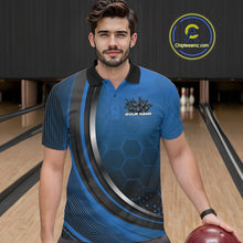 Load image into Gallery viewer, Male model in a bowling lane wearing a black and blue polo shirt with honeycomb texture and a flaming bowling strike illustration.