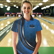 Load image into Gallery viewer, Female model in a bowling lane wearing a black and blue polo shirt with honeycomb texture and a flaming bowling strike graphic.