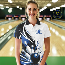 Load image into Gallery viewer, Female model shown from the front wearing a white, black, and blue bowling polo shirt featuring a flaming bowling ball striking pins artwork in a bowling lane.