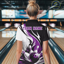 Load image into Gallery viewer, Back view of a female model wearing a white, black, and purple bowling polo shirt featuring a flaming bowling ball knocking down pins graphic at a bowling lane.