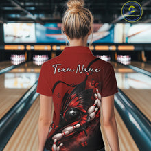 Load image into Gallery viewer, Back view of a female model in a bowling alley wearing a red and black quarter-zip shirt featuring a butterfly wrapped around a bowling ball.