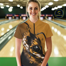 Load image into Gallery viewer, Female model shown from the front in a bowling center wearing a yellow and black quarter-zip shirt with butterfly, bowling ball, and pin graphics.
