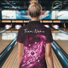 Load image into Gallery viewer, Back view of a female model at a bowling lane wearing a pink polo shirt featuring luminous butterfly wings and galaxy-inspired artwork.