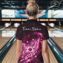 Load image into Gallery viewer, Back view of a female model at a bowling lane wearing a pink bowling quarter-zip shirt featuring glowing butterfly wings and galaxy-themed artwork.