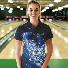 Load image into Gallery viewer, Female model at a bowling lane wearing a blue bowling polo shirt with luminous butterfly wings surrounding a bowling ball on the front.