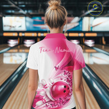 Load image into Gallery viewer, Back view of a white and pink women s bowling polo shirt showcasing butterfly artwork and bowling graphics at the bowling lane.