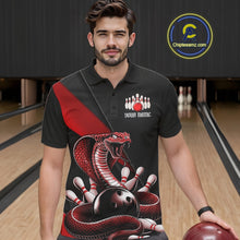 Load image into Gallery viewer, Male model at the bowling lane wearing a black bowling polo with red cobra graphics and bowling pin details.