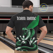 Load image into Gallery viewer, Front view of a black mens quarter-zip displaying a green cobra wrapped around a bowling ball with scattered pins.