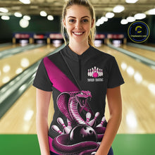 Load image into Gallery viewer, Female model wearing a black bowling quarter-zip at a bowling alley with pink cobra artwork surrounding a bowling ball.