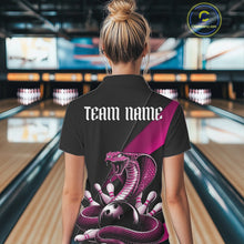 Load image into Gallery viewer, Back view of a black womens quarter-zip showcasing a pink cobra, bowling ball, and scattered pin graphics.